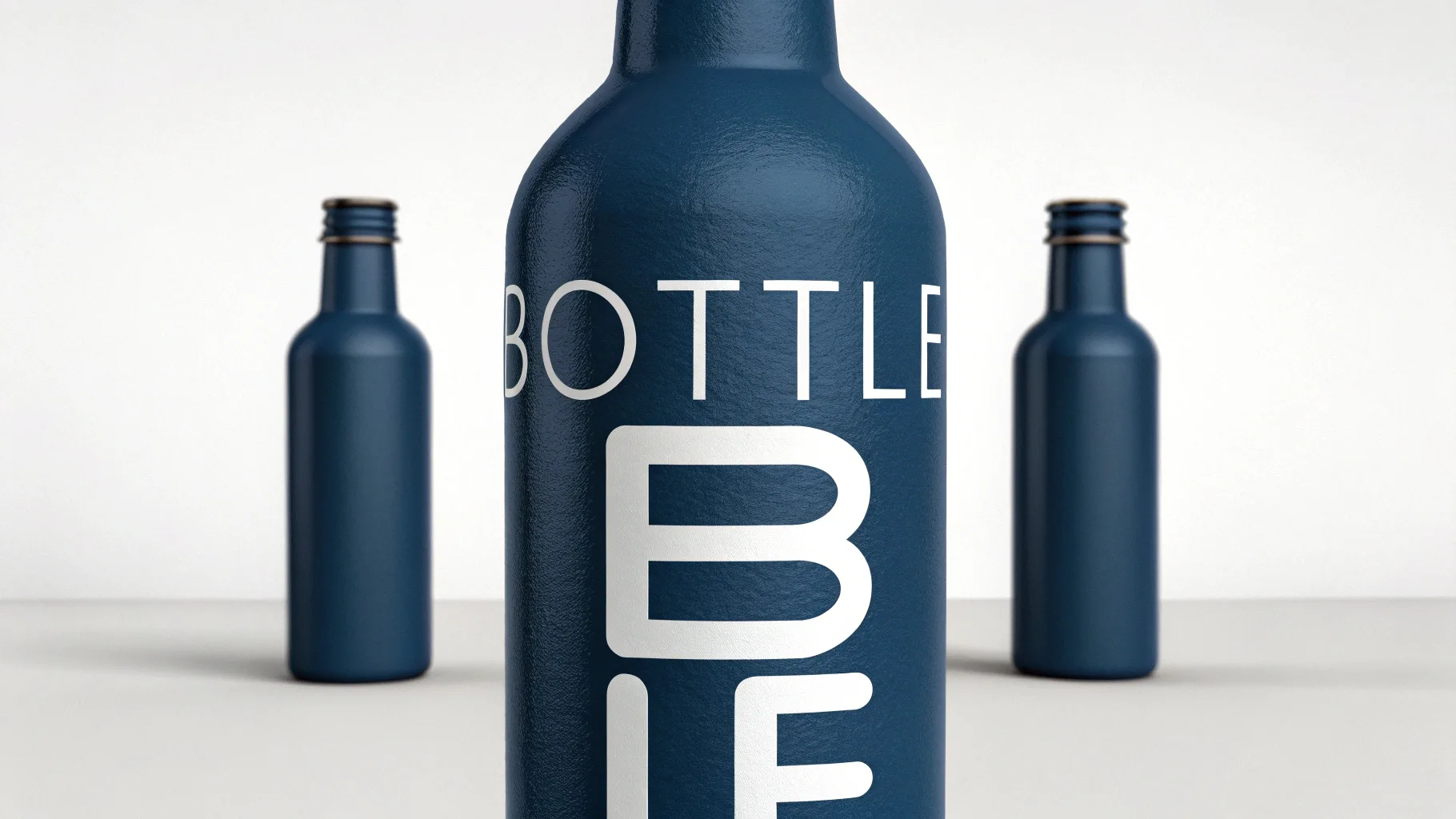 Dark blue bottle with large white typography.